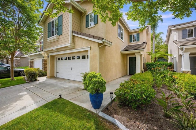 1752 Cottonwood Dr, Vista, CA 92081 - traditional-style house featuring a garage, driveway, and stucco siding