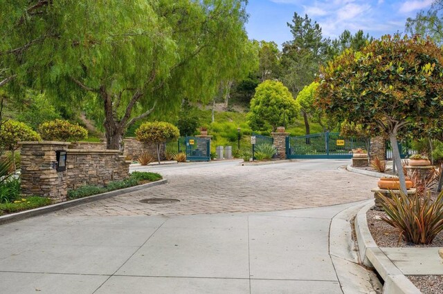 1752 Cottonwood Dr, Vista, CA 92081 - view of community featuring a gate and fence