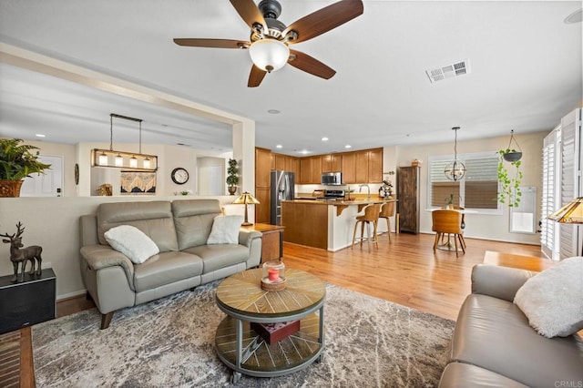 1752 Cottonwood Dr, Vista, CA 92081 - living area with light wood-style floors, ceiling fan, and recessed lighting