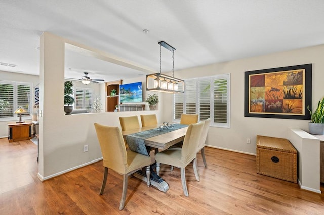 1752 Cottonwood Dr, Vista, CA 92081 - dining room featuring light wood-style floors, baseboards, and ceiling fan