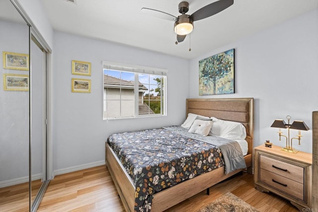 1752 Cottonwood Dr, Vista, CA 92081 - bedroom with light wood-type flooring, a closet, baseboards, and a ceiling fan