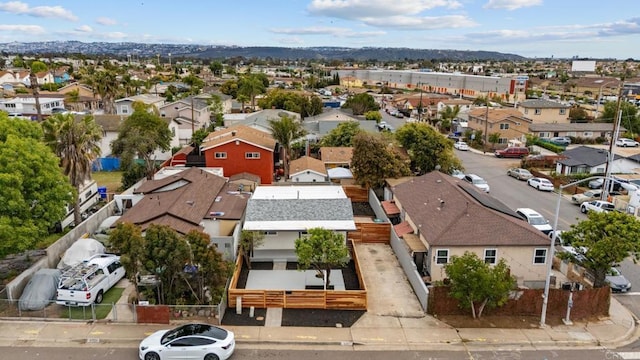 bird's eye view featuring a residential view and a mountain view