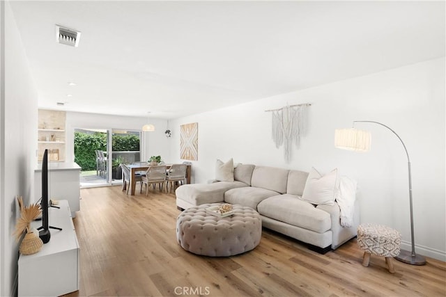 22352 Torino, Laguna Hills, CA 92653 - living area with light wood-style floors