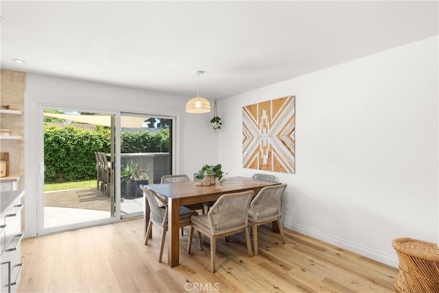 22352 Torino, Laguna Hills, CA 92653 - dining space featuring light wood-style flooring and baseboards
