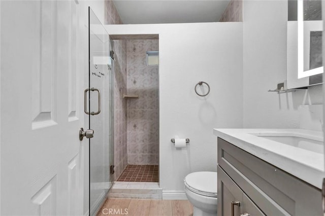 1302 S Gladys Ave, San Gabriel, CA 91776 - full bath featuring a shower stall, toilet, and vanity