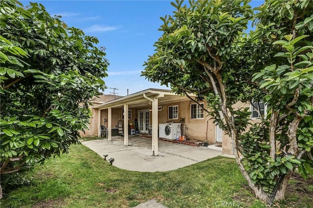 1302 S Gladys Ave, San Gabriel, CA 91776 - rear view of house with a patio, french doors, washer and clothes dryer, stucco siding, and a cooling unit