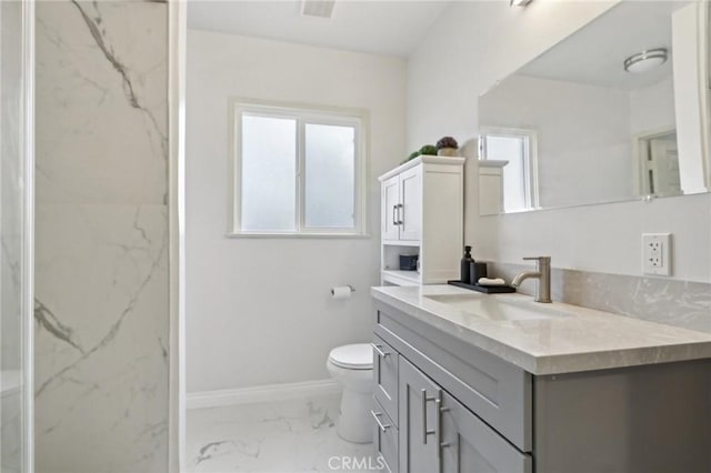 full bathroom with baseboards, marble finish floor, toilet, and vanity