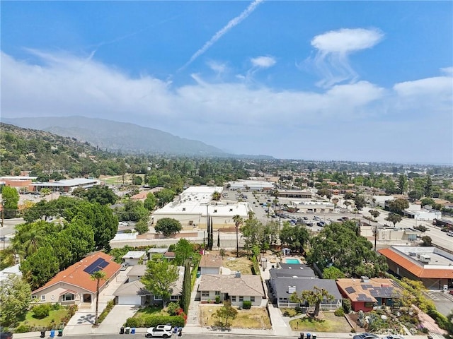 birds eye view of property featuring a mountain view