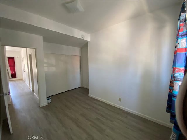 3755 Brockton Ave Unit 1-4, Riverside, CA 92501 - empty room with baseboards and wood finished floors
