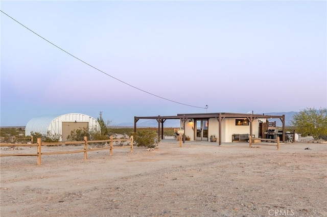 view of front of home with fence