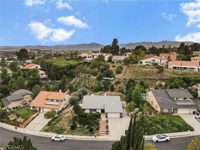 bird's eye view with a mountain view and a residential view