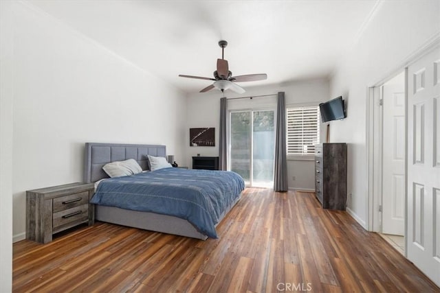 1050 Sleepy Hollow Rd, Paso Robles, CA 93446 - bedroom with access to outside, wood finished floors, baseboards, and ceiling fan