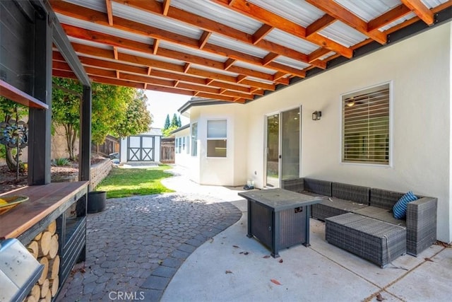 1050 Sleepy Hollow Rd, Paso Robles, CA 93446 - view of patio / terrace featuring a storage shed, an outdoor hangout area, and an outdoor structure