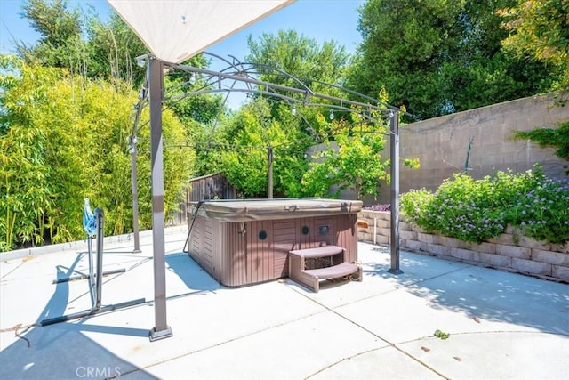 1050 Sleepy Hollow Rd, Paso Robles, CA 93446 - view of patio / terrace featuring a hot tub and a fenced backyard