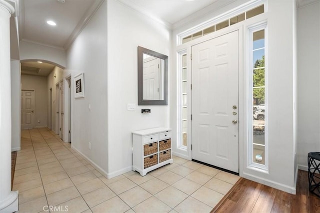 1050 Sleepy Hollow Rd, Paso Robles, CA 93446 - entrance foyer featuring ornamental molding, arched walkways, baseboards, and light wood-type flooring