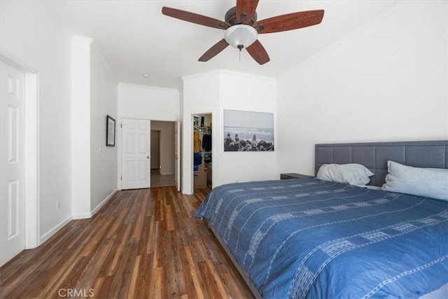 1050 Sleepy Hollow Rd, Paso Robles, CA 93446 - bedroom featuring wood finished floors, a spacious closet, ceiling fan, a closet, and baseboards