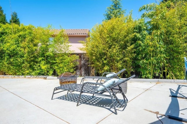 1050 Sleepy Hollow Rd, Paso Robles, CA 93446 - view of patio / terrace featuring a fire pit and fence