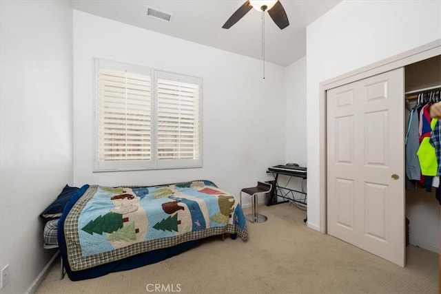1050 Sleepy Hollow Rd, Paso Robles, CA 93446 - bedroom with carpet floors, a closet, a ceiling fan, and baseboards