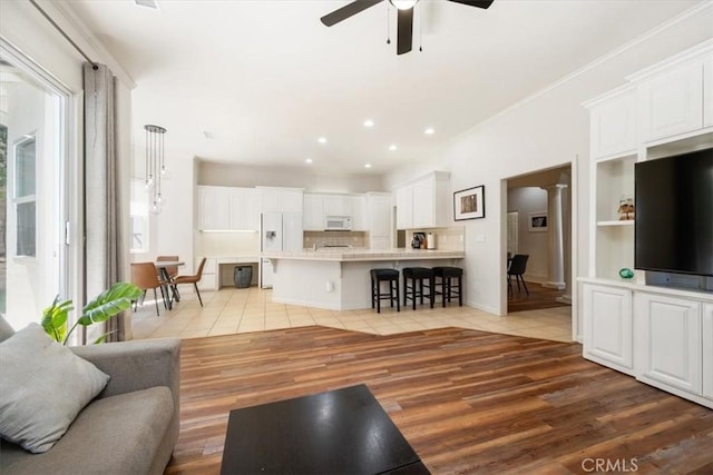 1050 Sleepy Hollow Rd, Paso Robles, CA 93446 - living area with light tile patterned floors, ceiling fan, baseboards, and recessed lighting