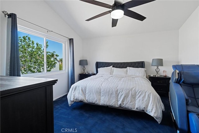 bedroom featuring carpet floors, ceiling fan, and vaulted ceiling