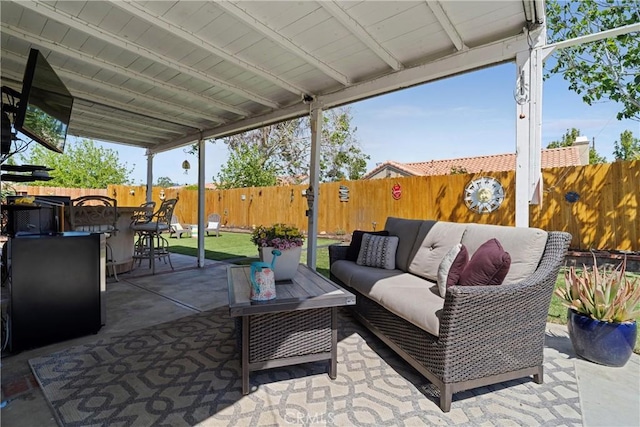 view of patio / terrace featuring a fenced backyard and outdoor lounge area