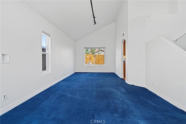 bonus room featuring carpet flooring, baseboards, and high vaulted ceiling