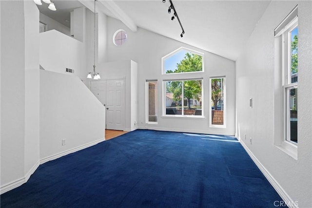unfurnished living room featuring carpet floors, baseboards, vaulted ceiling, and visible vents