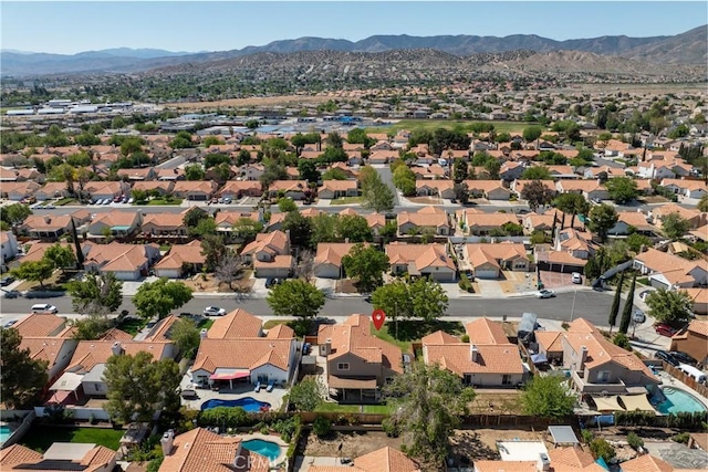 birds eye view of property featuring a residential view and a mountain view