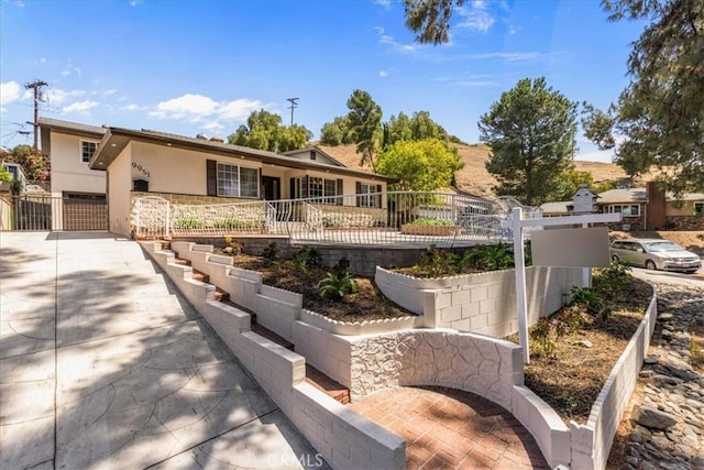 9951 Glencrest Cir, Sun Valley, CA 91504 - rear view of house featuring stucco siding