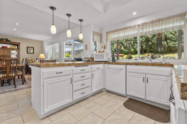 kitchen featuring recessed lighting, white cabinetry, hanging light fixtures, and white appliances