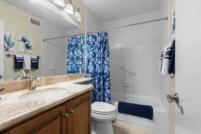 full bath featuring visible vents, tile patterned flooring, shower / tub combo, vanity, and toilet