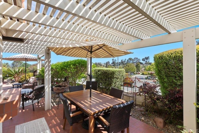 view of patio / terrace featuring a pergola and outdoor dining area