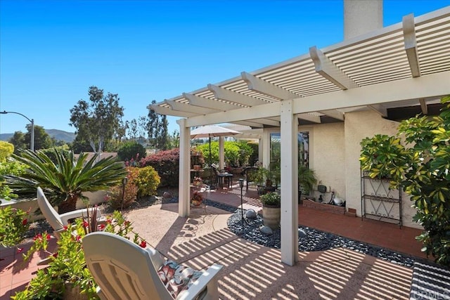 view of patio / terrace with a pergola