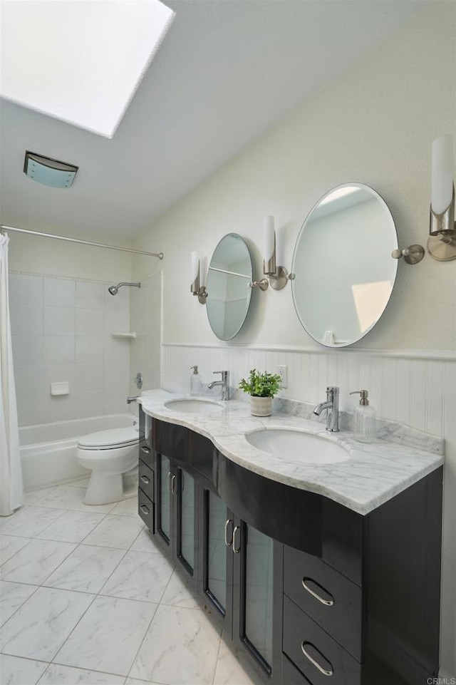 1719 Willowhaven Rd, Encinitas, CA 92024 - bathroom with double vanity, toilet, marble finish floor, and a sink
