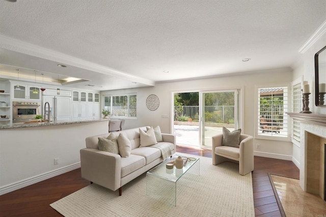 1719 Willowhaven Rd, Encinitas, CA 92024 - living room featuring a premium fireplace, crown molding, and hardwood / wood-style floors