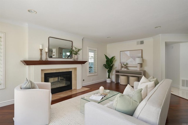 1719 Willowhaven Rd, Encinitas, CA 92024 - living room with baseboards, a tiled fireplace, visible vents, crown molding, and wood finished floors