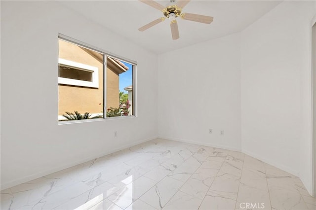37388 Medjool, Palm Desert, CA 92211 - empty room with light marble finish floors, baseboards, and ceiling fan