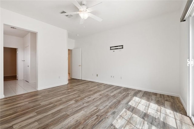 37388 Medjool, Palm Desert, CA 92211 - unfurnished room featuring a ceiling fan, light wood-style flooring, and baseboards