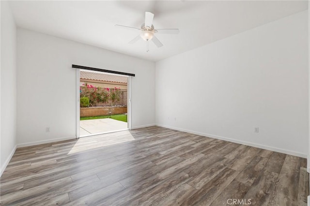 37388 Medjool, Palm Desert, CA 92211 - spare room featuring wood finished floors, baseboards, and a ceiling fan