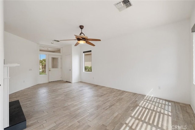 37388 Medjool, Palm Desert, CA 92211 - unfurnished room featuring plenty of natural light, light wood-style floors, and ceiling fan