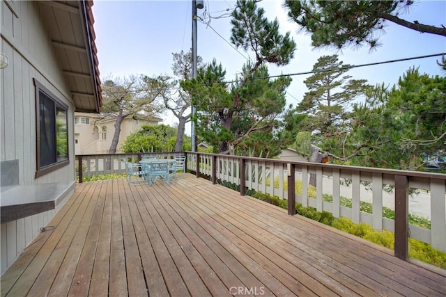 deck featuring outdoor dining space