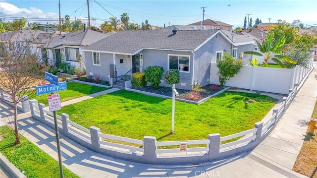 1402 E Luray St, Long Beach, CA 90807 - single story home featuring a shingled roof, fence private yard, a front yard, and stucco siding