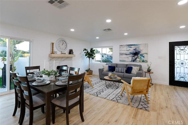 1402 E Luray St, Long Beach, CA 90807 - dining area with recessed lighting, visible vents, and light wood-style floors