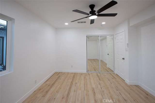1402 E Luray St, Long Beach, CA 90807 - unfurnished bedroom with visible vents, recessed lighting, baseboards, and wood finished floors