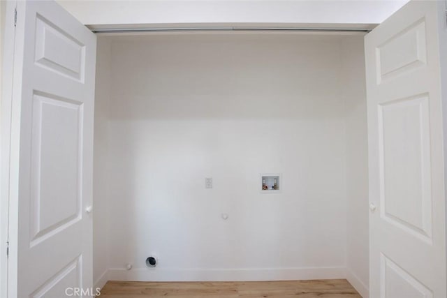 1402 E Luray St, Long Beach, CA 90807 - washroom with light wood-type flooring, laundry area, washer hookup, and baseboards
