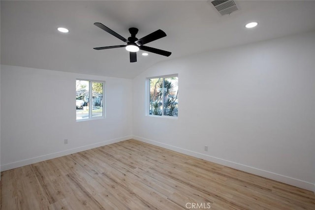 1402 E Luray St, Long Beach, CA 90807 - empty room featuring vaulted ceiling, recessed lighting, wood finished floors, and visible vents