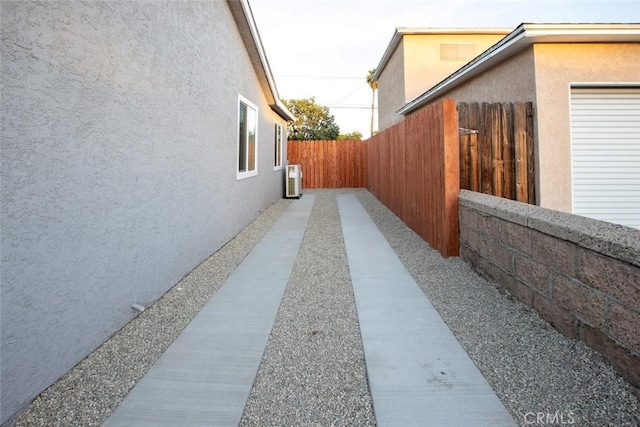 1402 E Luray St, Long Beach, CA 90807 - view of side of property with fence and stucco siding