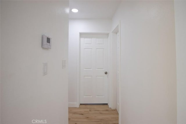 1402 E Luray St, Long Beach, CA 90807 - hallway featuring recessed lighting and light wood-style flooring