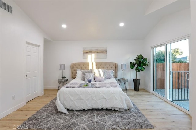 1402 E Luray St, Long Beach, CA 90807 - bedroom with visible vents, access to exterior, baseboards, light wood-type flooring, and vaulted ceiling