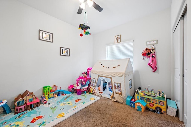 game room featuring a ceiling fan and carpet flooring